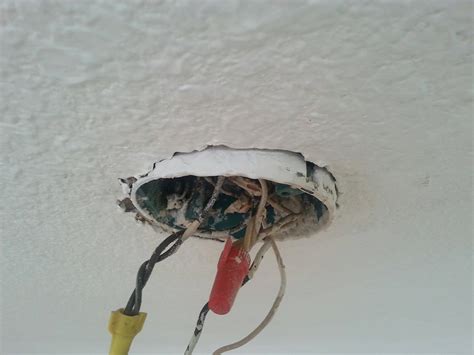 electrical ceiling box isn't properly secured|loose ceiling light box repair.